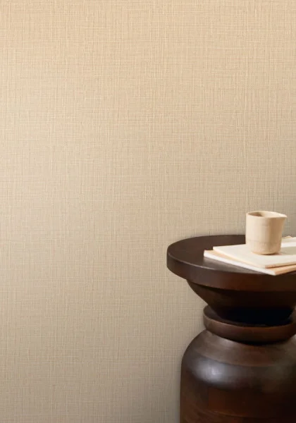 Sierra Wallpaper - Coquille by neutral plain wallpaper and wall with side table and vases