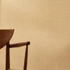 yellow plain wallpaper and wall with chair
