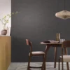 black-grey plain wallpaper and wall with dining table and armchair