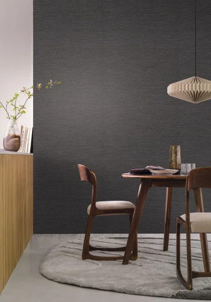 Occitan Wallpaper - Ébène by black-grey plain wallpaper and wall with dining table and armchair