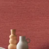 red plain wallpaper and wall with coffee table and vases