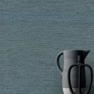 blue plain wallpaper and wall with coffee table and vases