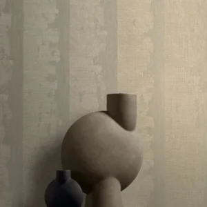neutral striped wallpaper and wall with coffee table and vases