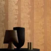 orange striped wallpaper and wall with coffee table and vases