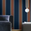 blue striped wallpaper and wall with armchair and lamps