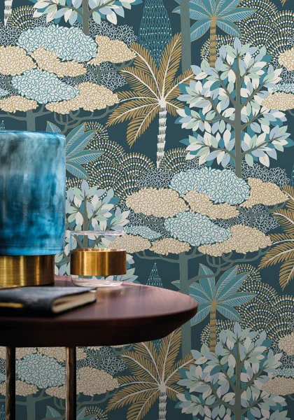 Marakanda Wallpaper - Marine / Dore by blue botanical wallpaper and wall with side table and vases