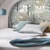 blue botanical wallpaper and wall with bed and cushion