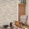 neutral contemporary wallpaper and wall with armchair and vases