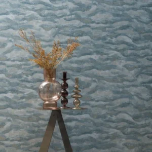 blue contemporary wallpaper and wall with side table and vases
