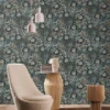 blue botanical wallpaper and wall with armchair and lamps