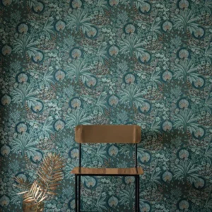blue botanical wallpaper and wall with chair and plants