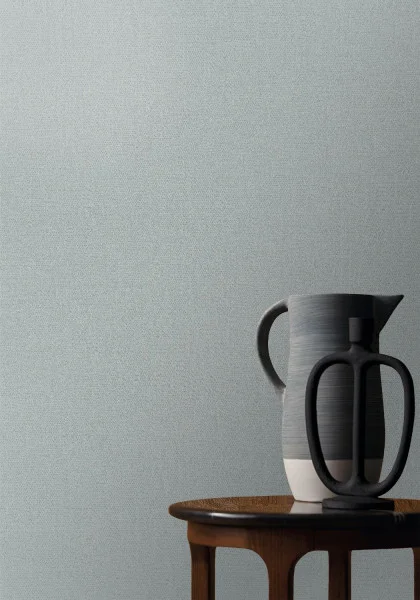 Octa Wallpaper - Gris Nuage by blue plain wallpaper and wall with side table and vases