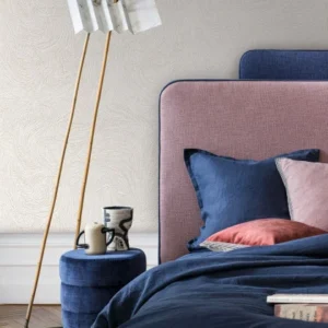 white misc wallpaper and wall with cushion and pouf
