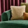 yellow plain curtain with sofa and cushion