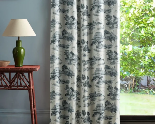 Brockhampton Estate Fabric - Woad by black-grey botanical curtain with side table and lamps