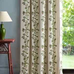 green striped curtain with side table and lamps