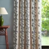 purple striped curtain with side table and lamps