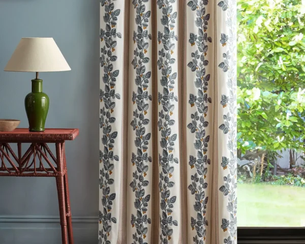 purple striped curtain with side table and lamps