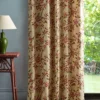 red botanical curtain with side table and lamps