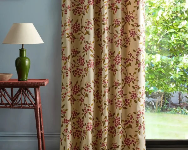 Damson Blossom Fabric - Madder / Olive by red botanical curtain with side table and lamps