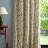 brown botanical curtain with side table and lamps