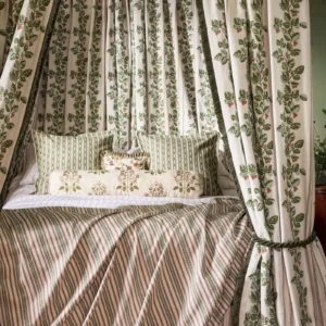 brown botanical bed with cushion and curtain