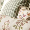 brown botanical cushion with