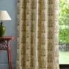 brown botanical curtain with side table and lamps