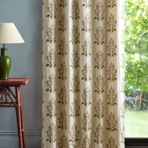 pink botanical curtain with side table and lamps