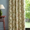 green animal curtain with side table and lamps