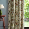 brown botanical curtain with side table and lamps