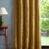 brown botanical curtain with side table and lamps