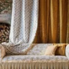 brown botanical curtain with sofa and cushion