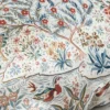 blue botanical cushion with