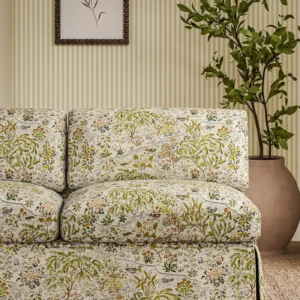 green botanical sofa with plants