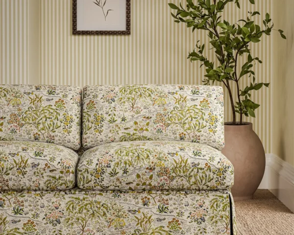 green botanical sofa with plants