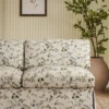 blue botanical sofa with plants