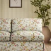 black-grey botanical sofa with plants