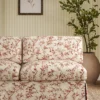 red botanical sofa with plants