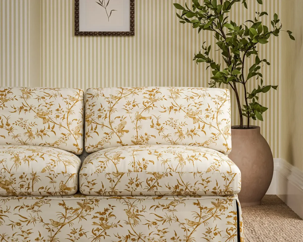 Paradise Woods Toile Fabric - Mustard by yellow botanical sofa with plants