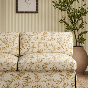 yellow botanical sofa with plants