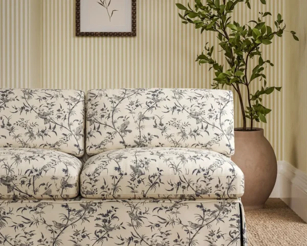Paradise Woods Toile Fabric - Woad by blue botanical sofa with plants