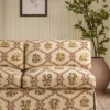 red animal sofa with plants