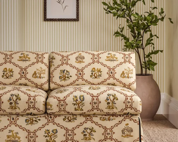 red animal sofa with plants