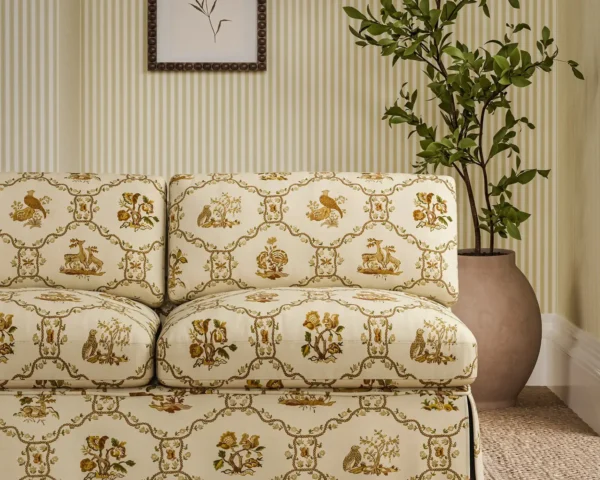 Partridge Pear Fabric - Walnut / Harvest by brown animal sofa with plants