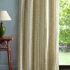 neutral striped curtain with side table and lamps