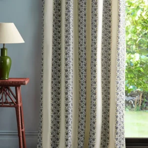 blue striped curtain with side table and lamps