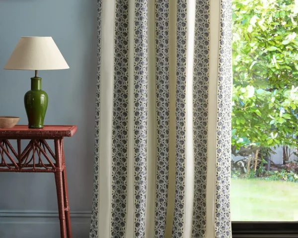 Sloe Blossom Fabric - Woad / Porcelain by blue striped curtain with side table and lamps