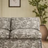 brown botanical sofa with plants