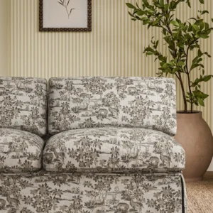 brown botanical sofa with plants